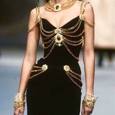 90s chanel black dress with chains|90s Chanel logo.